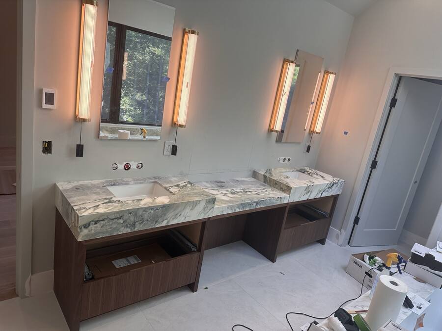 Floating walnut vanity — same marble as our featured tub