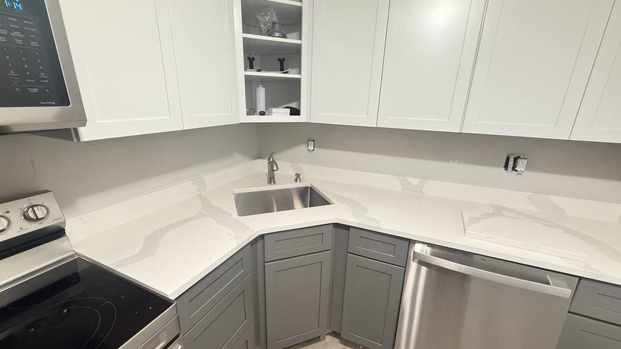 Calacatta quartz counters & tile backsplash