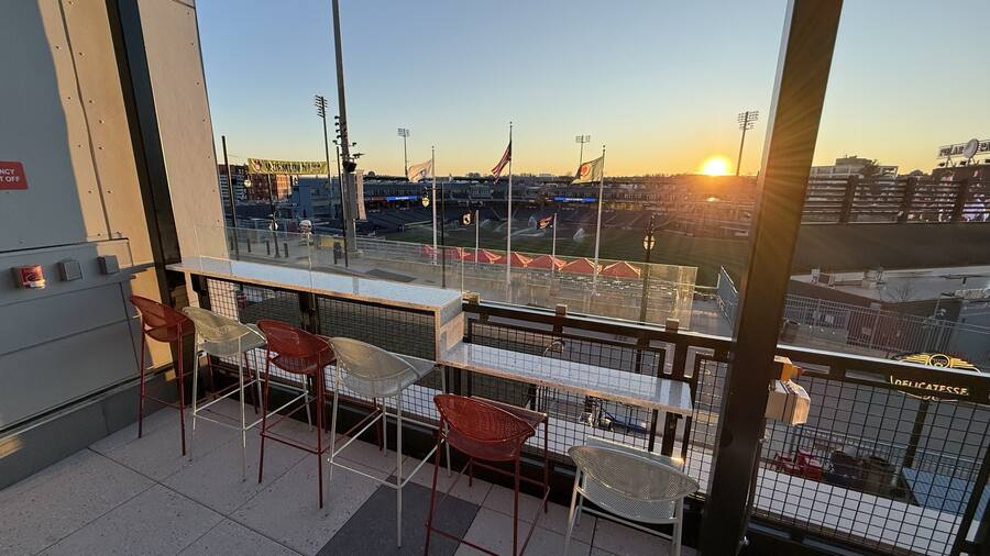 Rooftop bar with terrazzo drink rails